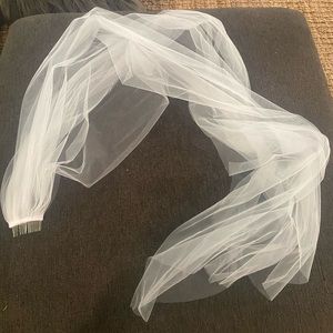 Very long white veil